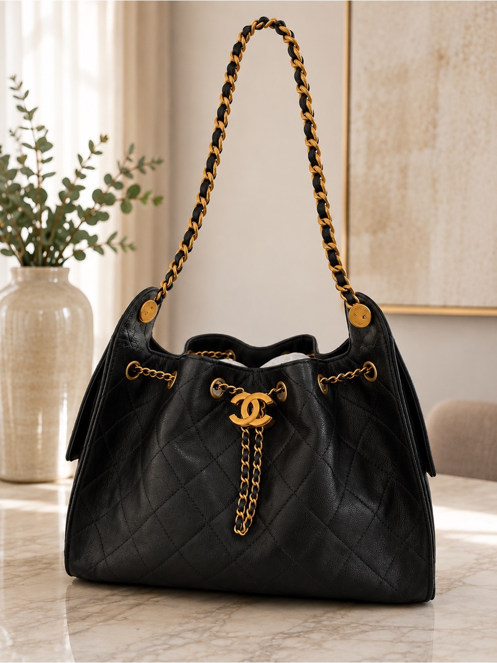 CHANEL Black Quilted Leather Shoulder Bag with Gold Chain & CC Logo
